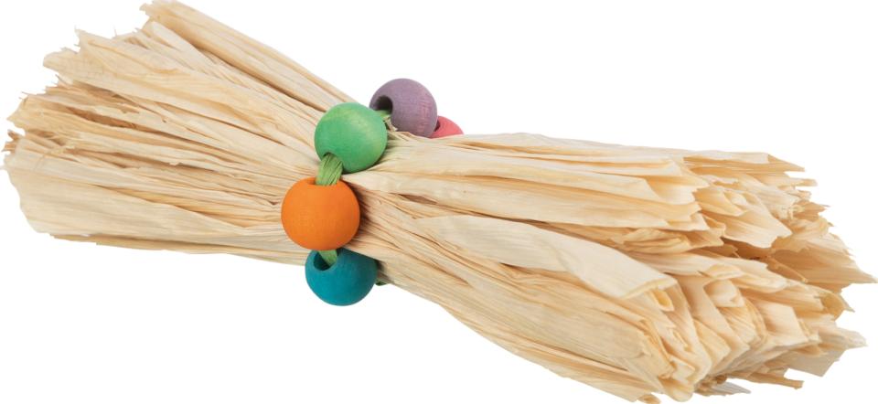 Toy with maize leaf and wood